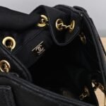 CHANEL Classic quilted chain-strap bucket bag