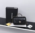 CHANEL Black quilted leather handbag with chain strap