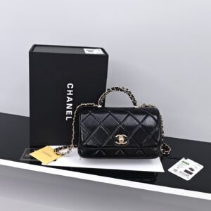 CHANEL Black quilted leather handbag with chain strap