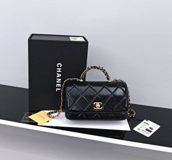 CHANEL Black quilted leather handbag with chain strap