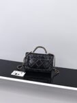 CHANEL Black quilted leather handbag with chain strap