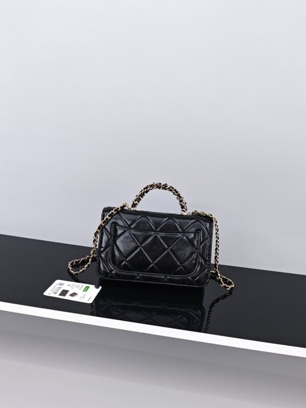 CHANEL Black quilted leather handbag with chain strap