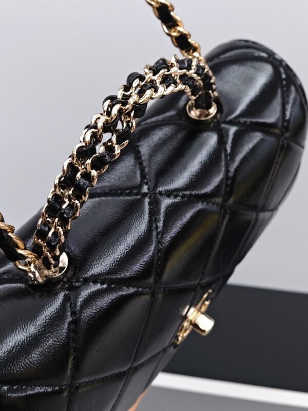 CHANEL Black quilted leather handbag with chain strap