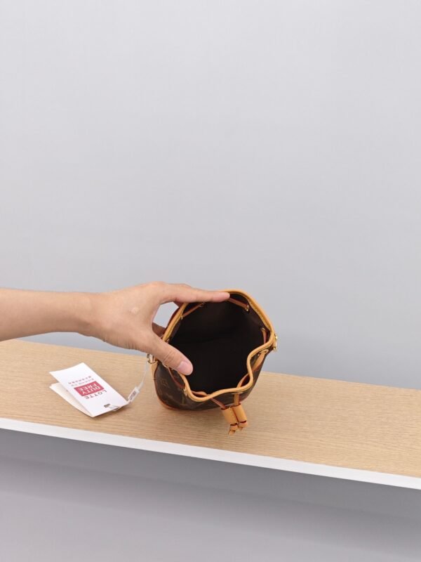 LV Pochette Voyage Mini Bucket Bag