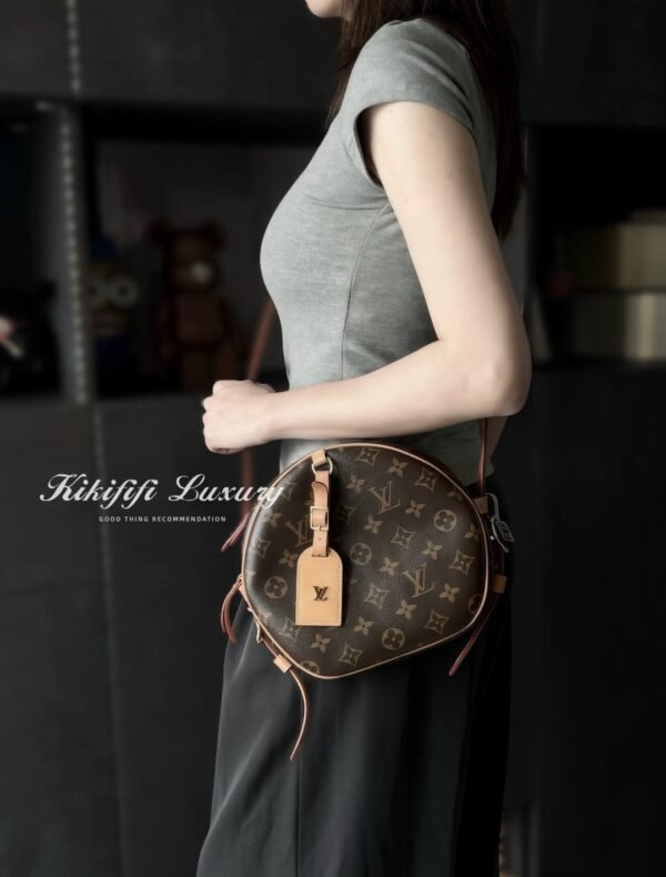 LV soft round pouch bag